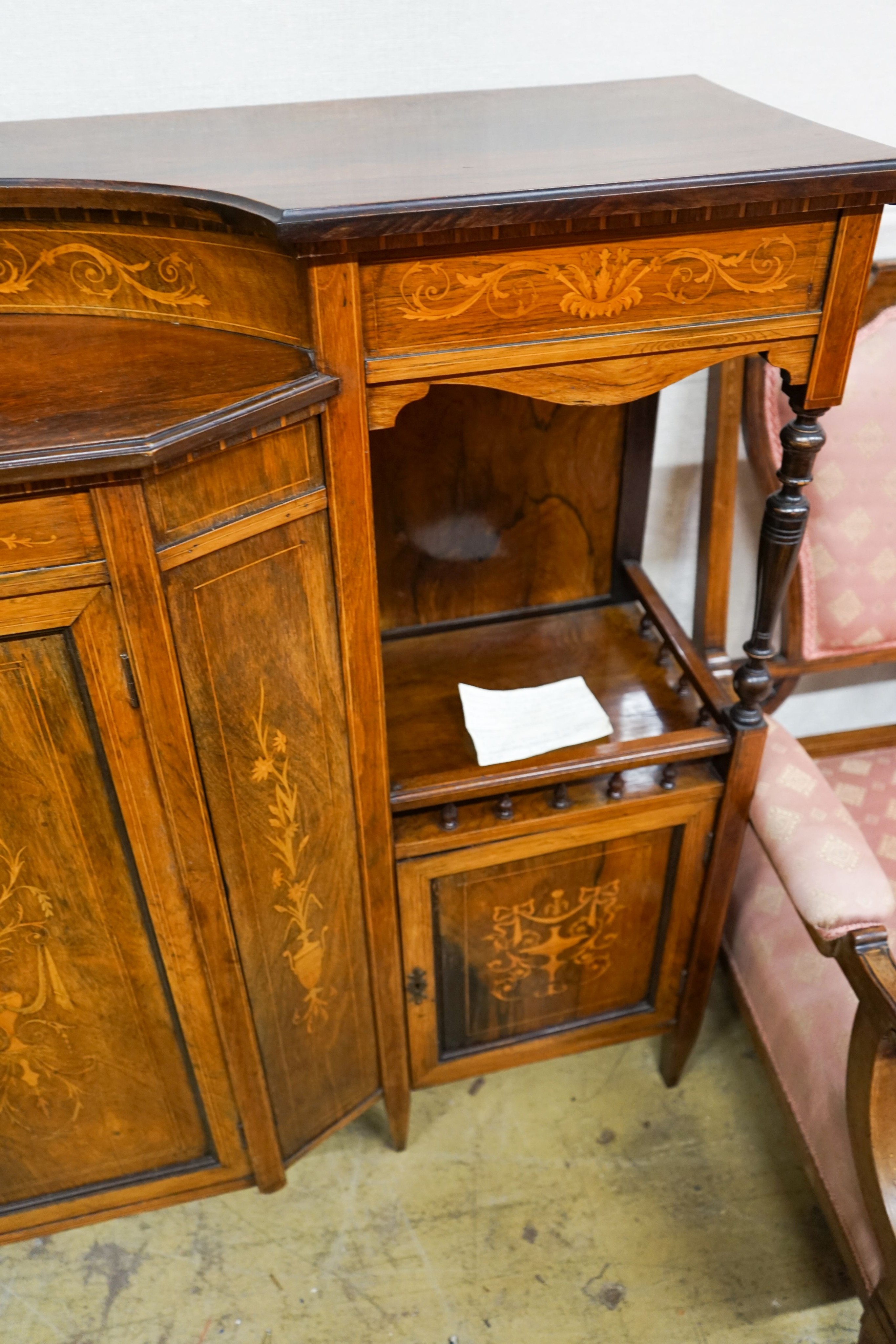 A late Victorian marquetry inlaid rosewood side cabinet, width 136cm, depth 39cm, height 104cm